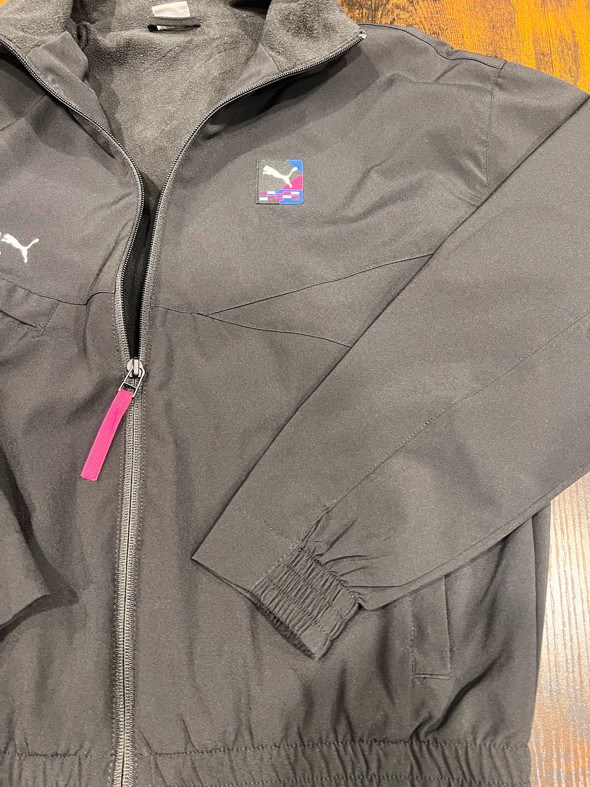 Giacca sportiva Puma International nera            modello bomber      tg Xs