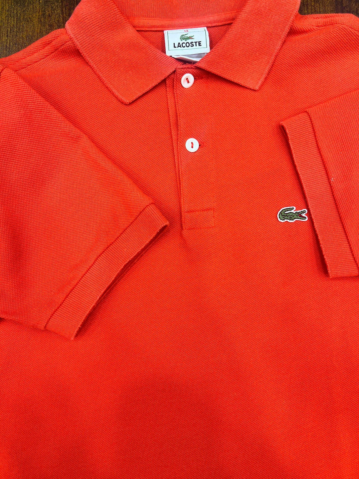 Lacoste classica in cotone piqué di colore arancione tg 14anni